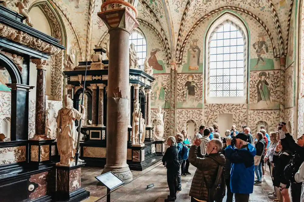Interior of ancient church with columns and decorated walls