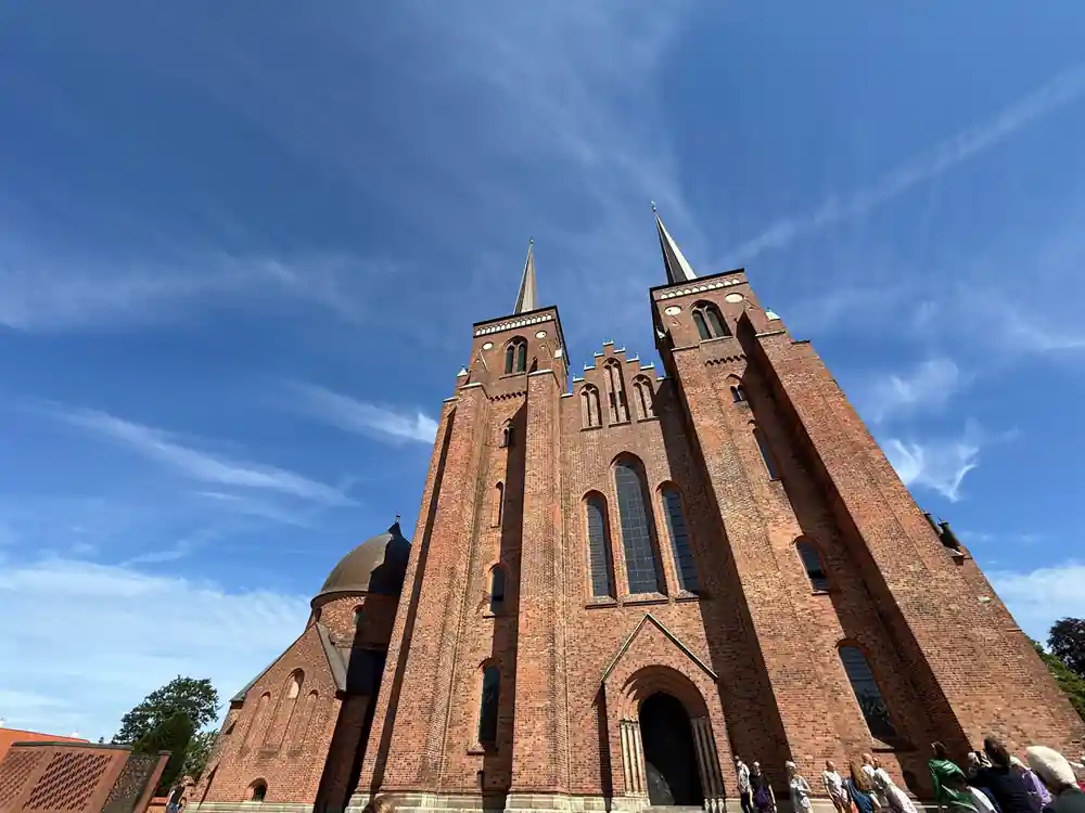 Red brick cathedral with twin pointed spires