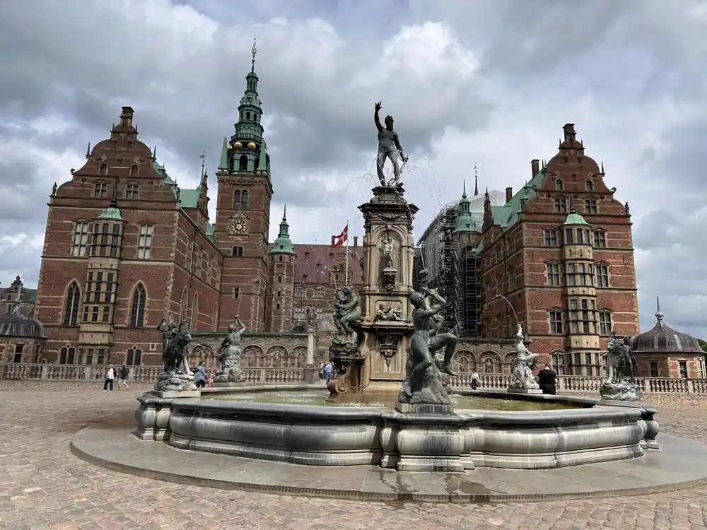 Renaissance palace with fountain and copper spires