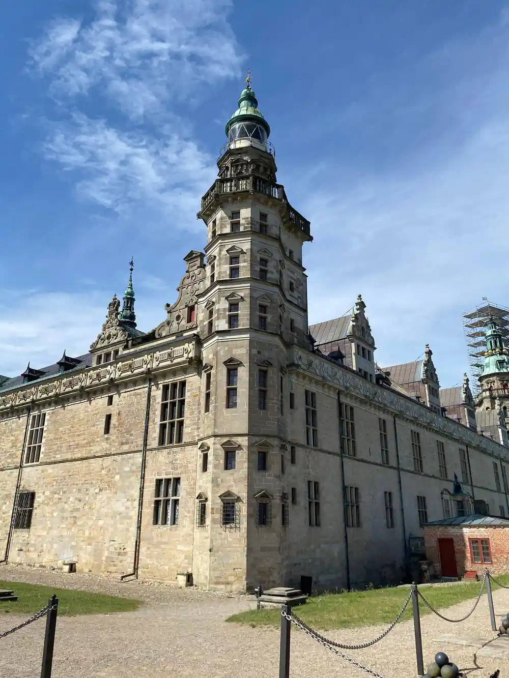 Stone castle tower with distinctive architectural crown